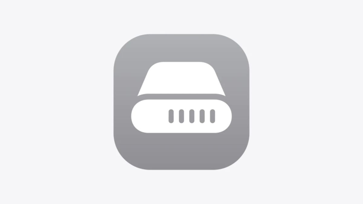 A white hard drive symbol inside a gray rounded square on a pale background