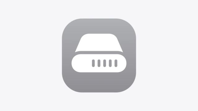 A white hard drive symbol inside a gray rounded square on a pale background