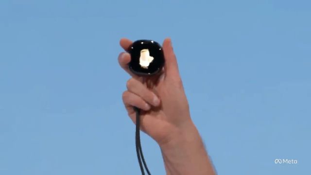 A Muse Charm device held up during Meta's Connect 2026 presentation